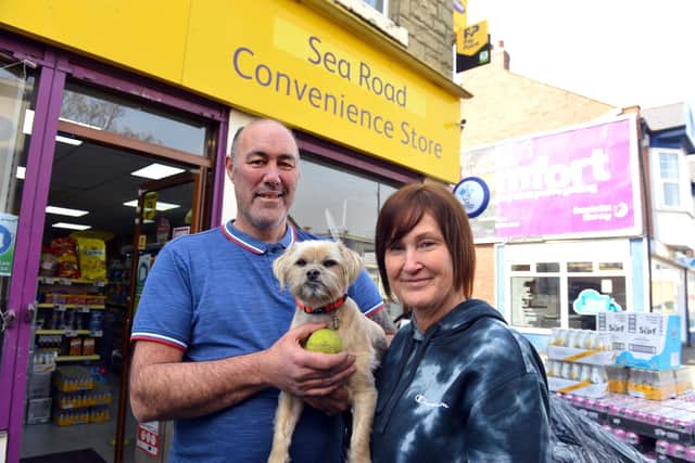 Sea Road Convenience Store new owners Jeff and Beverley Manship and dog Marley welcome dogs in the store to avoid any risk of theft.