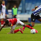 SHEFFIELD, ENGLAND - JULY 22: Jacob Murphy of Sheffield Wednesday is challenged by Marvin Johnson of Middlesbrough during the Sky Bet Championship match between Sheffield Wednesday and Middlesbrough at Hillsborough Stadium on July 22, 2020 in Sheffield, England.