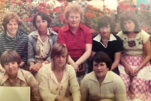 Joan pictured with some of her pupils at Hetton School on a trip to France in the 1980s.