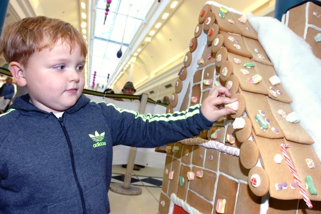 Kai McKinnell, 4, got up close to the giant gingerbread house in the Bridges Shopping Centre, part of the City Council's Fairy Tales programme of events running up to Christmas in 2011. If gingerbread houses are a festive favourite for you, it is Gingerbread House Day on December 10.
