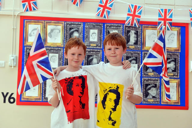 Oxclose Primary Academy twins Bobby and Harry Grainger, both 11, celebrating the Queen's seven decades on the throne.