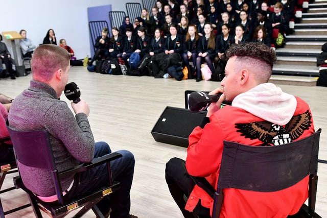 BBC Bitesize presenter Nick Bright (left) was talking with Adam Willington from Ubisoft as pupils from St. Anthonys Girls Catholic Academy look on in 2019.