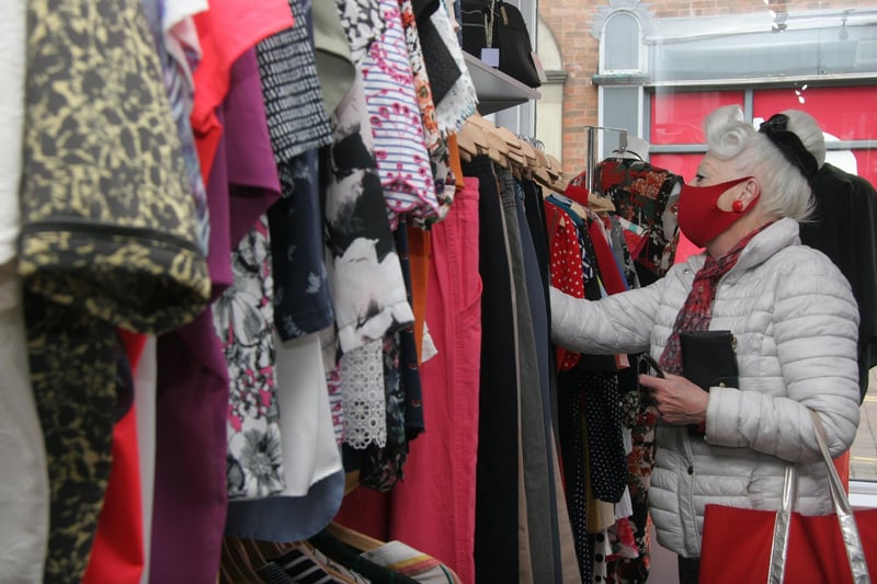 A customer browses the second hand selection at Ashgate Hospice's Chesterfield shop
