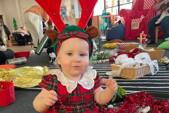 Emmie-Rosie, age 15 months, ready to help Santa this Christmas.