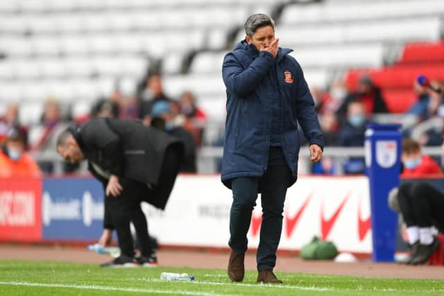 SUNDERLAND, ENGLAND - MAY 22: Sunderland manager Lee Johnson reacts dejectedly during the Sky Bet League One Play-off Semi Final 2nd Leg match between Sunderland and Lincoln City  at Stadium of Light on May 22, 2021 in Sunderland, England. (Photo by Stu Forster/Getty Images)