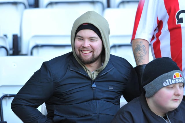 A Sunderland fan smiles at the Stadium of Light as Sunderland defeat Portsmouth.