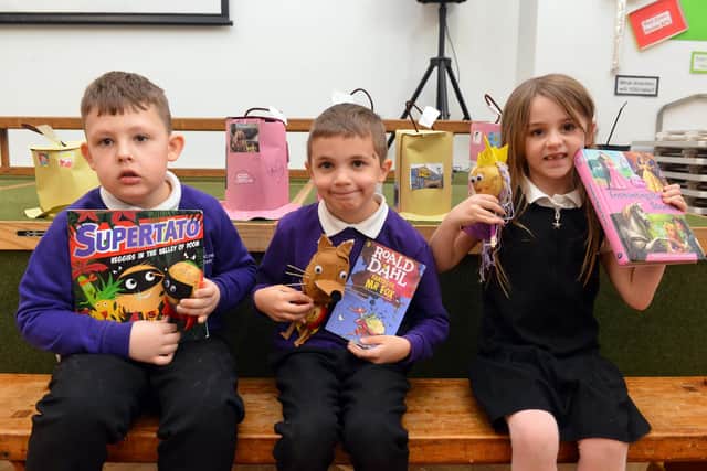 Hasting Hill Academy pupils Brandon Craggs, 7, Michael Holmes, 6 and Isla Martin, 6, with their potato designs.