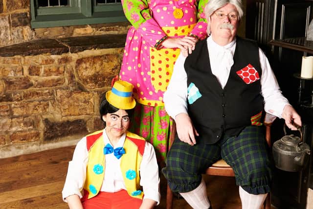 l to r, Clare Archer as Pinocchio, Lee Passmoor as Dame Mamma Mia, and Lawrence Clark as Geppetto. Photo by Iain Patterson