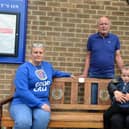 Sitting on the bench are Honest Boy manager Judith Pike, left, Bob Lindsay a family friend of the Walkers, Richard's sister Bage Walker and her children Rayne Kemp, two and Lexi Kemp, seven. Image, Sunderland Echo.