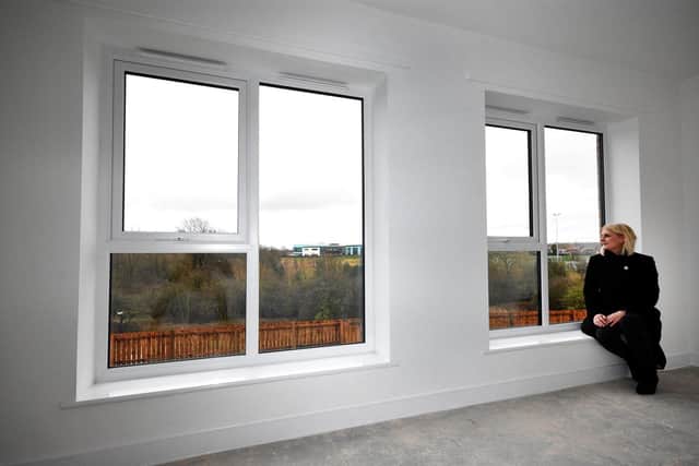 Gentoo's Development Director Joanne Gordon admires the view in one of the larger-size bedrooms at  Gentoo's new Liberty Grange homes at Hylton Castle.