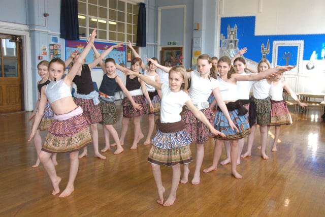 Year 6 pupils made their own skirts and took part in a drumming and dance session during an African workshop from Grace Aciro 14 years ago.