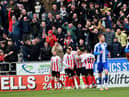 Sunderland players celebrate after scoring against Wigan. Picture by FRANK REID