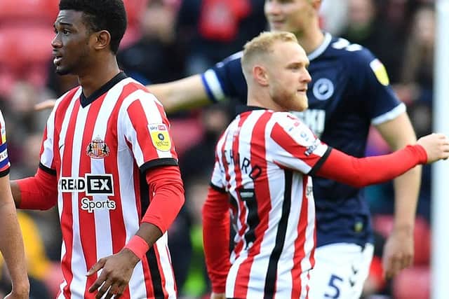 Amad Diallo and Alex Pritchard playing for Sunderland against Millwall.