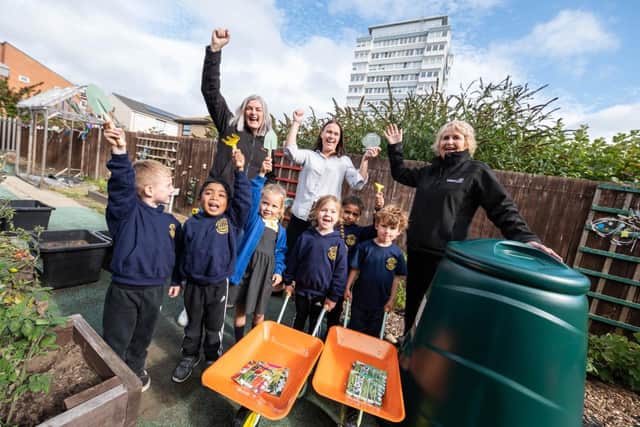 Back from left: Catherine Loftus of Gentoo Group, teacher Gayle Stoddart and Chris Baillie of Tolent with green-fingered Dame Dorothy Primary School pupils.