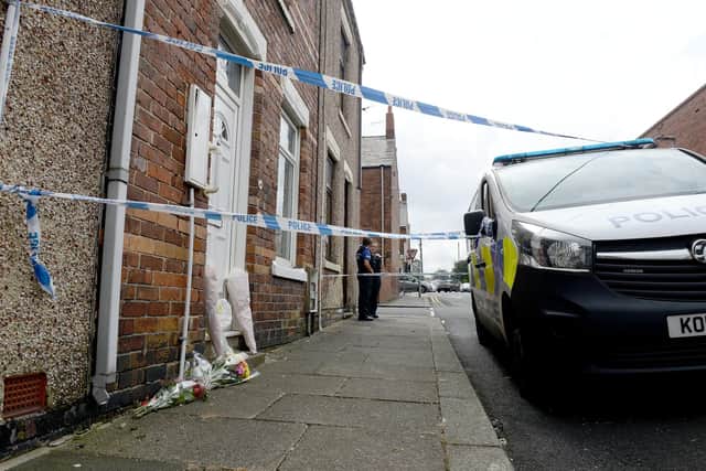 Police cordoned off the house as part of inquiries into the tragic death of John Littlewood.