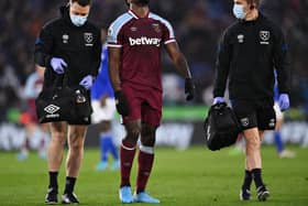 Michail Antonio of West Ham United receives medical treatment during the Premier League match between Leicester City and West Ham United at The King Power Stadium on February 13, 2022 in Leicester, England. (Photo by Laurence Griffiths/Getty Images)