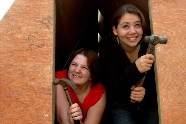 Prince's Trust volunteers made a new house out of wood for a piglet 16 years ago. Here are Aimee Lisle and Kathleen James.