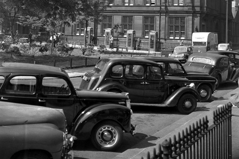 An undated photo showing the old post office in Norfolk Street. Look at the classic cars parked up.
