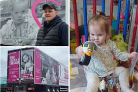 Beatrix Archbold - the little girl whose face is featured on a new 44ft billboard on the side of a trailer.