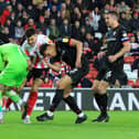 Sunderland defender Danny Batth battles for the ball.