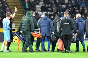 Elliot Embleton is stretchered off against Hull City