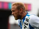 Alex Pritchard of Huddersfield Town reacts during the pre-season friendly between Rochdale and Huddersfield Town at Crown Oil Arena.