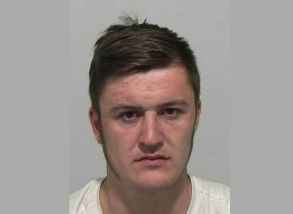 Robert Friendship Smith, 23, is wanted by police in connection with an assault and breach of police bail