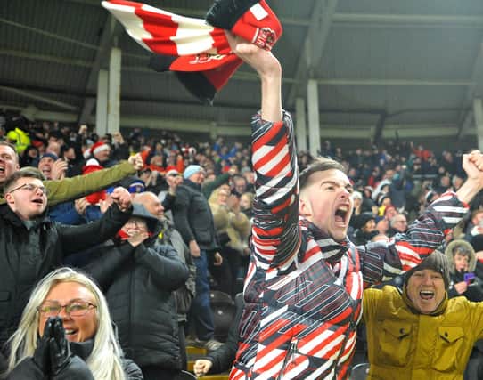 Sunderland fans show their passion at the end of the game away from home against Hull City.