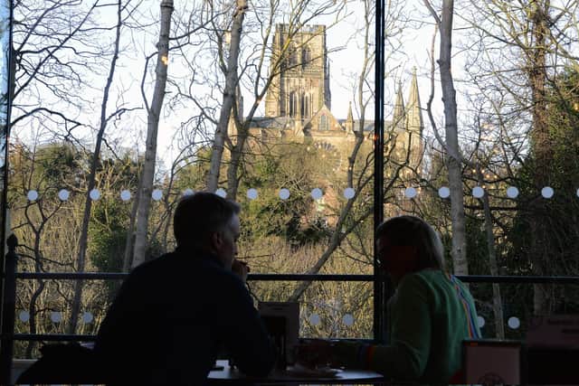 Floor to ceiling windows offer views of Durham Cathedral