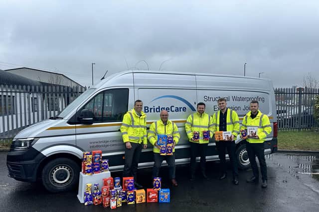 Workers at Bridge Care UK Ltd dropping off their donation to the appeal.
