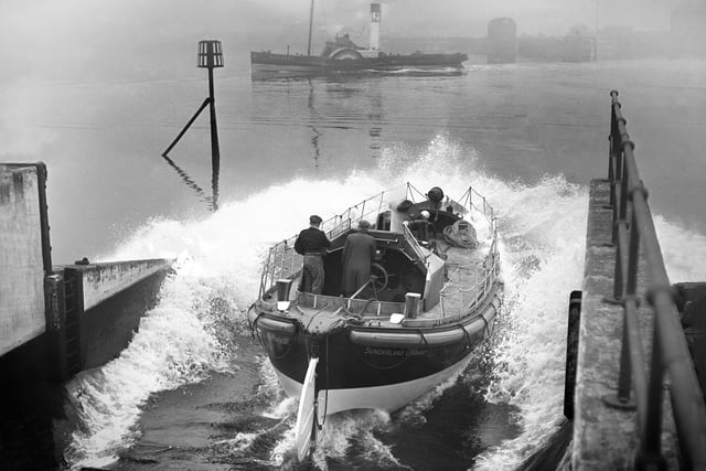 The Watson-class lifeboat Edward and Isabella Irwin being launched from the slipway of the RNLI station at South Dock in January 1950.