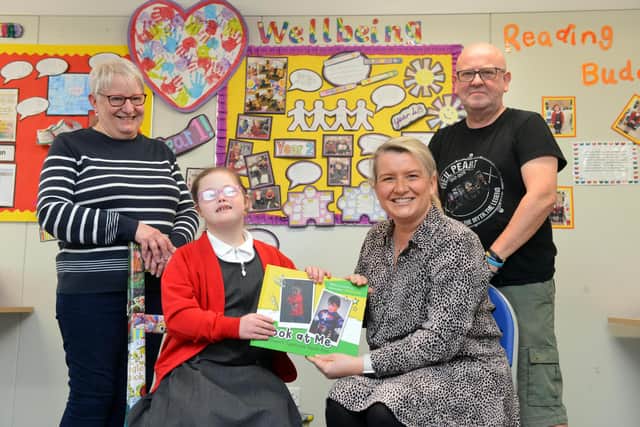 Ella Bond, 10, with headteacher Leona Kelly and parents Lesley and Kevin Bond.