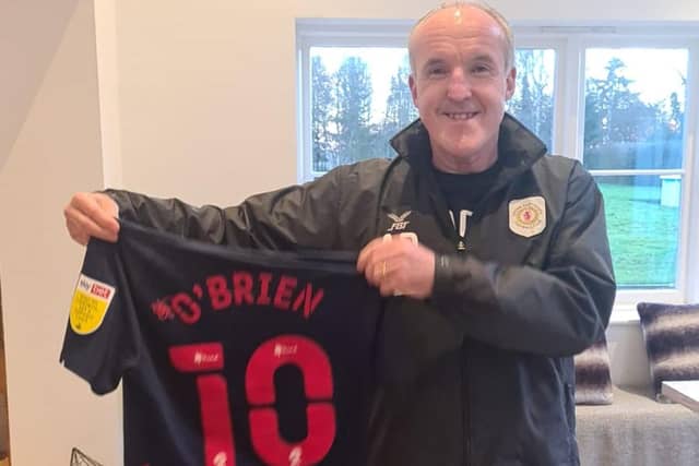 Austin Doherty with the shirt given to him by Sunderland after he helped treat midfielder Grant Leadbitter during the club's 2-2 draw at Crewe last weekend.