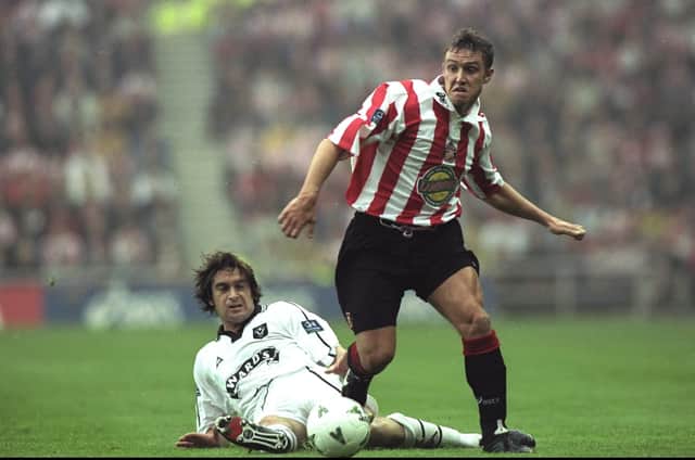 13 May 1998:  Lee Clark of Sunderland is tackled by Ian Hamilton of Sheffield United during the Nationwide League Divison One play-off at the Stadium of Light in Sunderland, England. Sunderland won the match 2-0. \ Mandatory Credit: Shaun  Botterill/Allsport