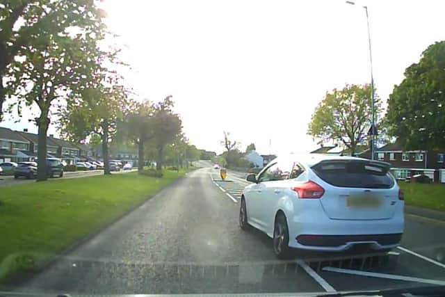 Shocking dash-cam footage shows car overtaking at high speed in Houghton street