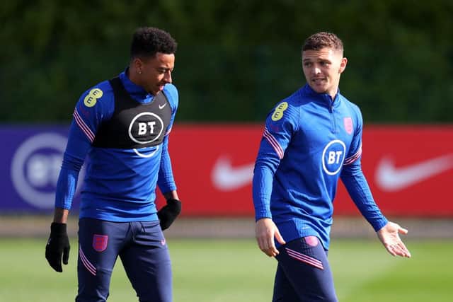 Jesse Lingard and Kieran Trippier of England interact during a training session at Tottenham Hotspur Training Centre on October 11, 2021 in Enfield, England. (Photo by Catherine Ivill/Getty Images)