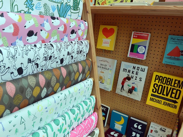 Books and wrapping paper inside Fred Aldous.