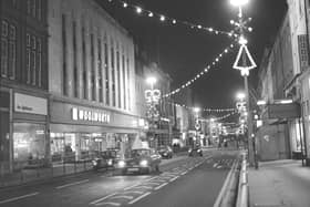 Woolworths in Fawcett Street, alongside the Christmas illuminations, pictured in December 1974.