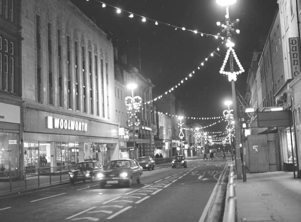 Woolworths in Fawcett Street, alongside the Christmas illuminations, pictured in December 1974.