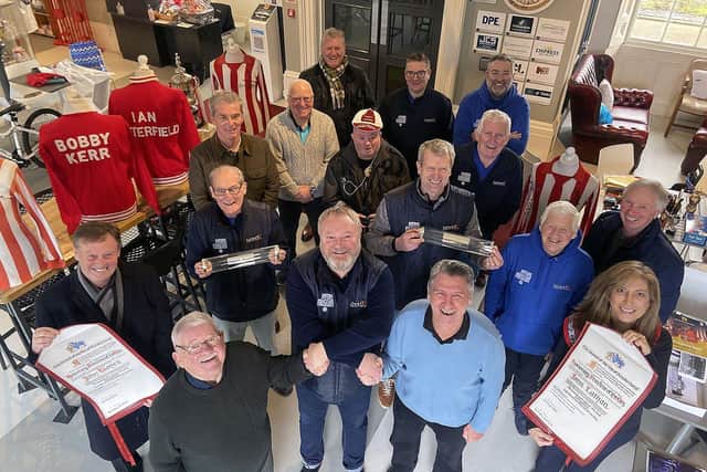 Michael Ganley (front centre) welcomes former Sunderland captain and F A Cup winner Bobby Kerr (left) and former F A Cup squad member John Lathan with Museum volunteers and guests, including John's wife Lauren