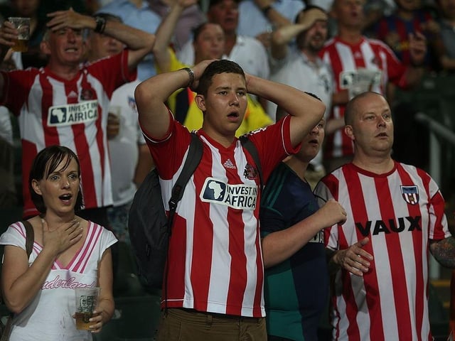 Sunderland fans react to a missed shot at goal during the Barclays Asia Trophy Semi Final match between Tottenham Hotspur and Sunderland at Hong Kong Stadium on July 24, 2013.