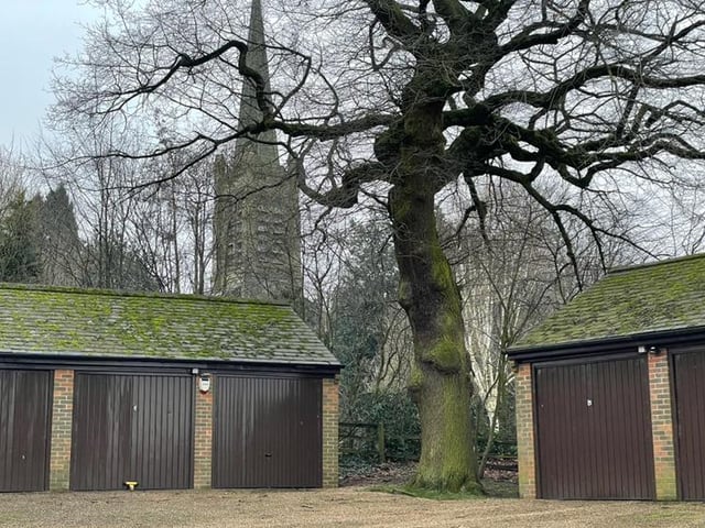 With trees and the village church in the background, this pictures gives an idea of the rustic setting for Park Mews.