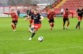 Grant Leadbitter scores the opening goal at Sincil Bank