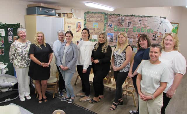 (far left) Director of Early Help at Together for Children Sunderland, Karen Davison, alongside nursery manager Tracy Rawding (second left) and the rest of the Bump to Baby Project team.

Photograph: Together for Children