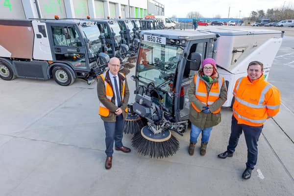 Cllr Claire Rowntree with council fleet management officer Peter Metcalfe and director of environmental services, Marc Morley.