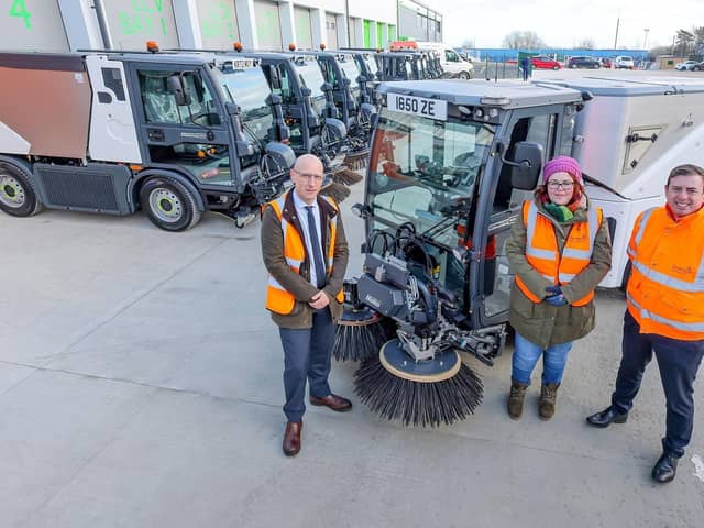 Cllr Claire Rowntree with council fleet management officer Peter Metcalfe and director of environmental services, Marc Morley.