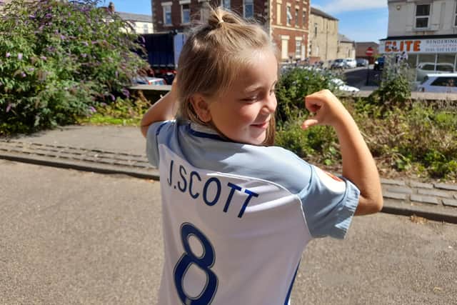 Isla Frost, who appropriately is eight, was wearing an old shirt of Euro winner Jill Scott.