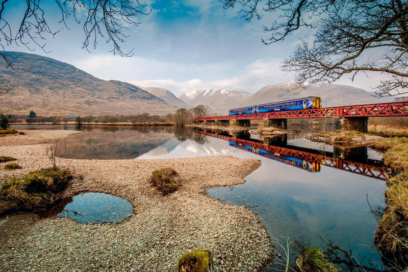A Scotrail train crosses Loch Awe, in Argyll and Bute.