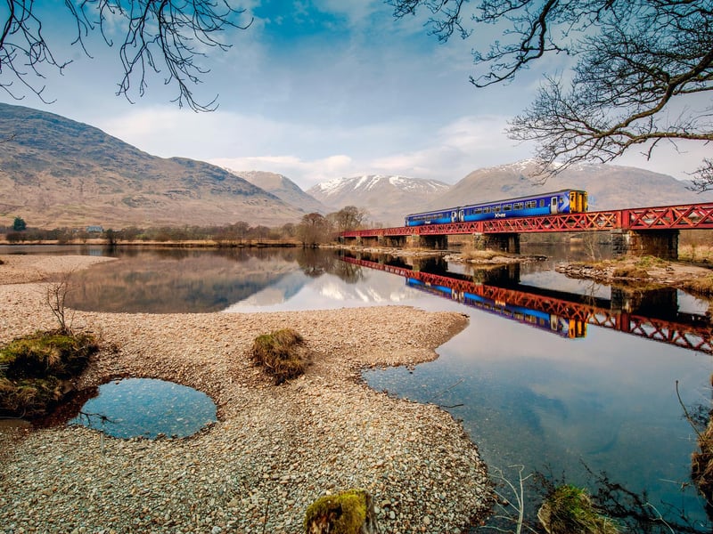 A Scotrail train crosses Loch Awe, in Argyll and Bute.