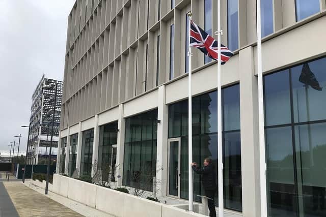 The Union flag at City Hall raised to mark the proclamation of King Charles III. It is lowered again to half-mast on Sunday for the mourning period.